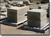 Sawn natural stone caps and pavers.