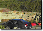 Natural stone retaining wall.